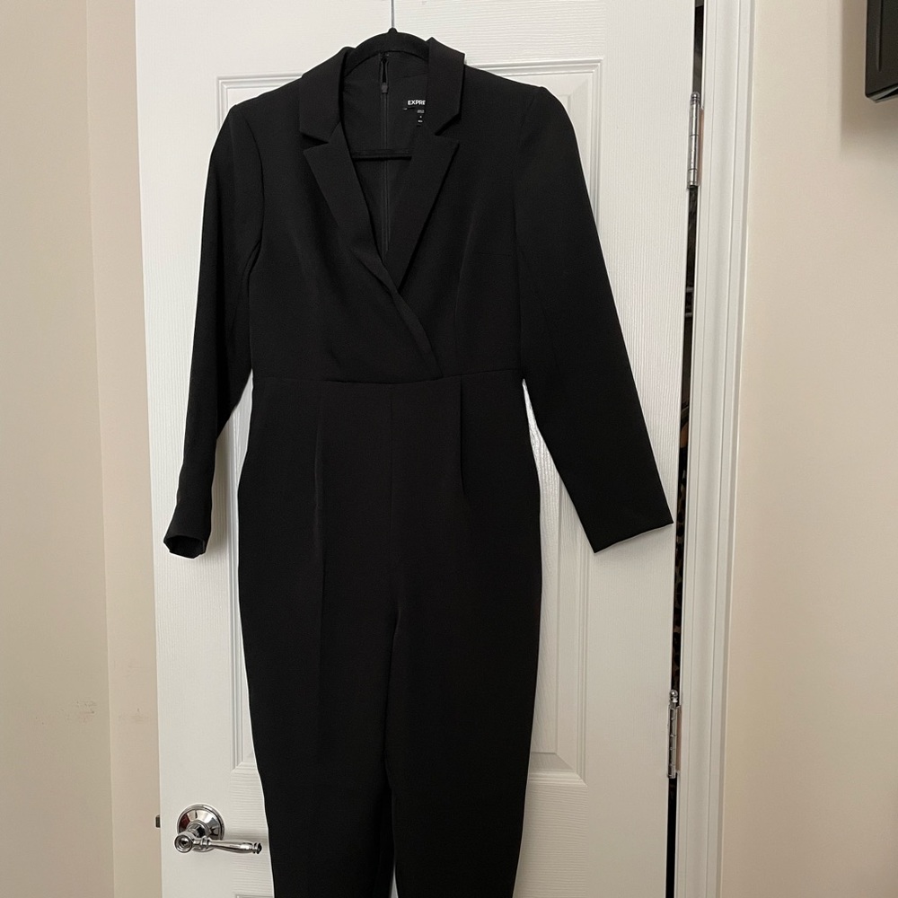 Express, size 6 Petite, One piece black jumpsuit with full back zipper.